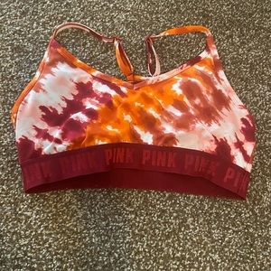 Pink sports bra. Large. Worn a few times.